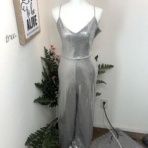 Bebe sequin jumpsuit with drape back